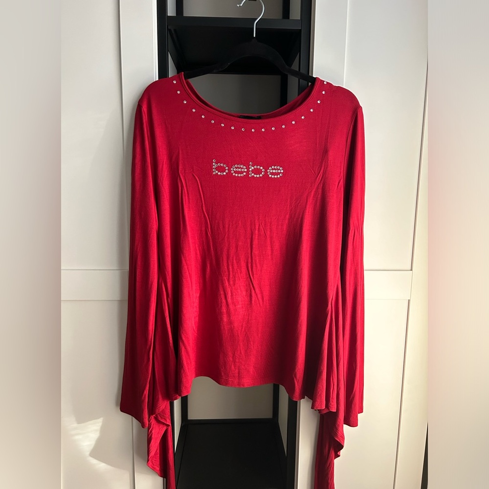 BRAND NEW! Long sleeve shirt. By BeBe size XL.